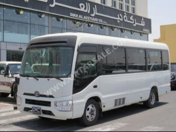 Toyota  Coaster  2020  Manual  126,000 Km  4 Cylinder  Rear Wheel Drive (RWD)  Van / Bus  White
