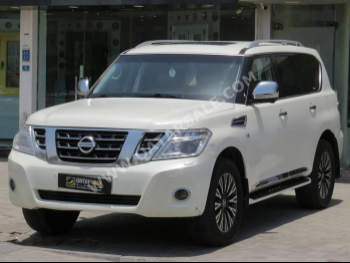 Nissan  Patrol  Platinum  2015  Automatic  290,000 Km  8 Cylinder  Four Wheel Drive (4WD)  SUV  White