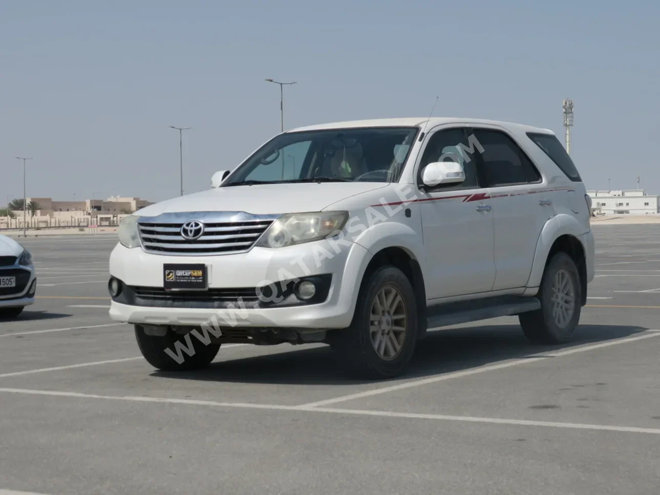  Toyota  Fortuner  2014  Automatic  243,000 Km  4 Cylinder  Four Wheel Drive (4WD)  SUV  White  With Warranty