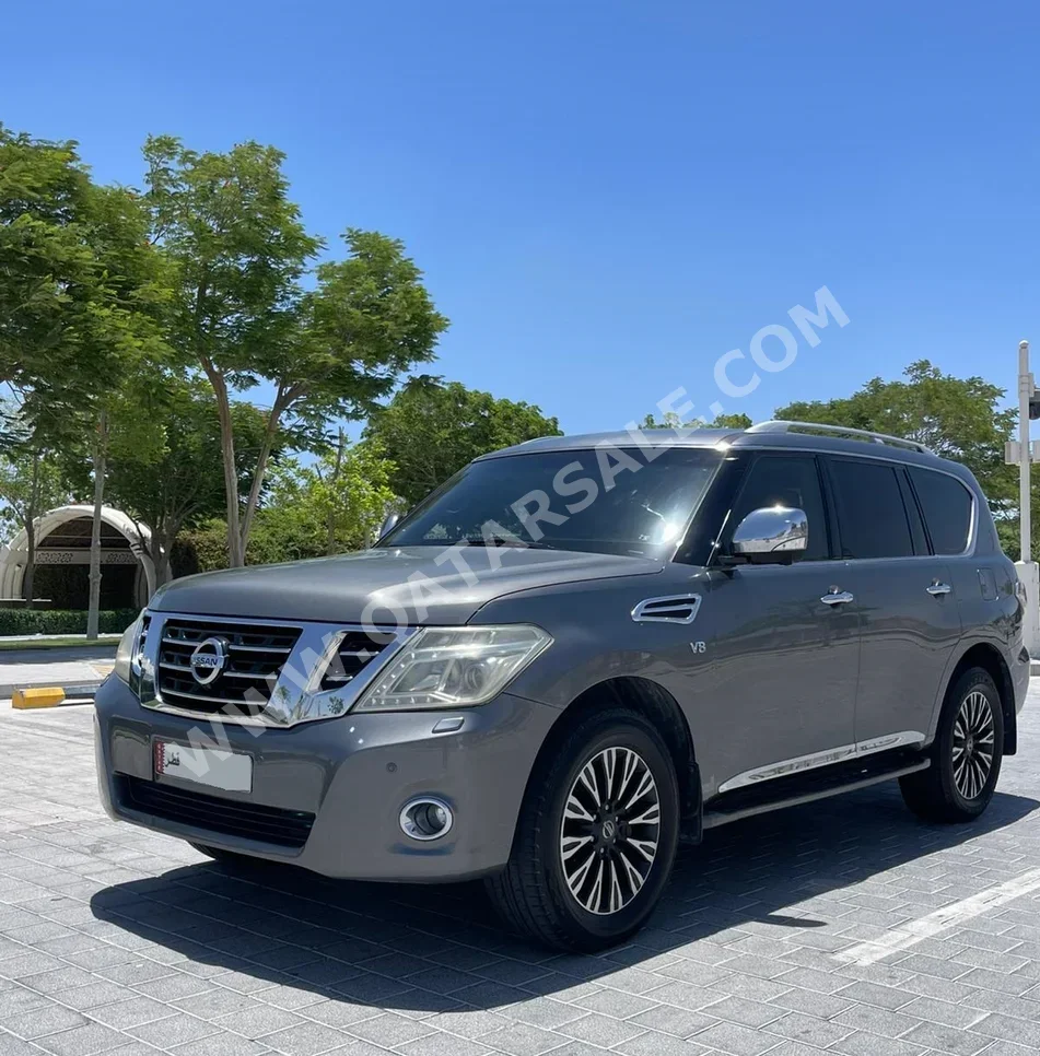Nissan  Patrol  Platinum  2014  Automatic  270,000 Km  8 Cylinder  Four Wheel Drive (4WD)  SUV  Gray