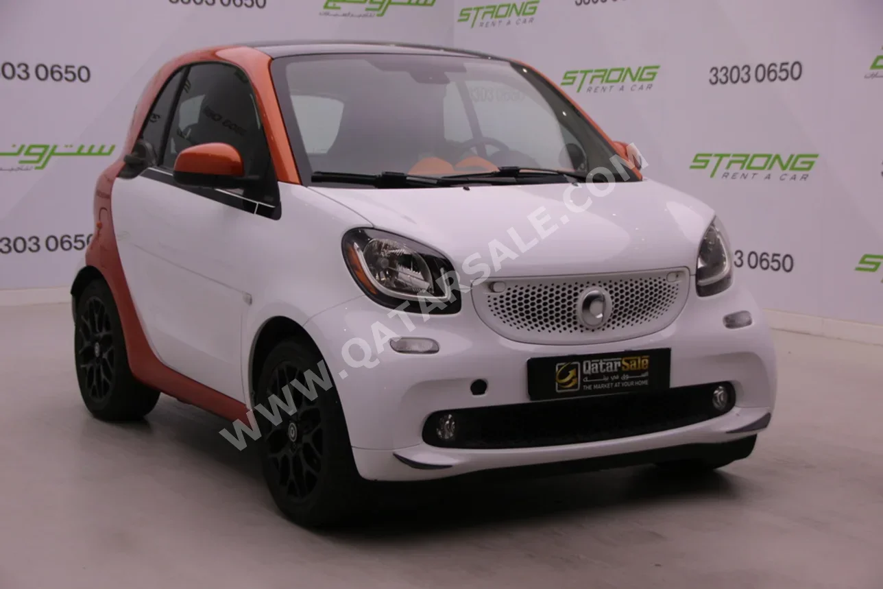 Smart  Passion  Edition 1  2016  Automatic  50,000 Km  3 Cylinder  Front Wheel Drive (FWD)  Hatchback  White