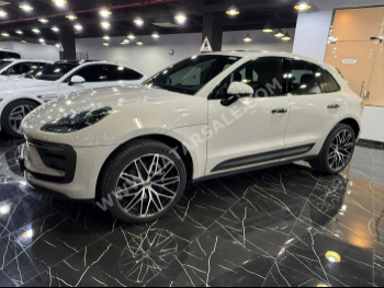 Porsche  Macan  2023  Automatic  24,000 Km  4 Cylinder  Four Wheel Drive (4WD)  SUV  White