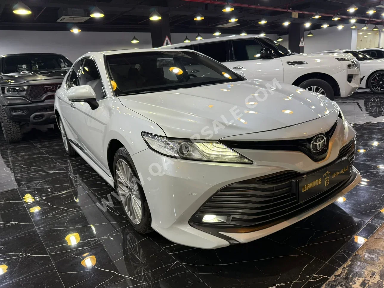 Toyota  Camry  Limited  2019  Automatic  168,000 Km  6 Cylinder  Front Wheel Drive (FWD)  Sedan  White