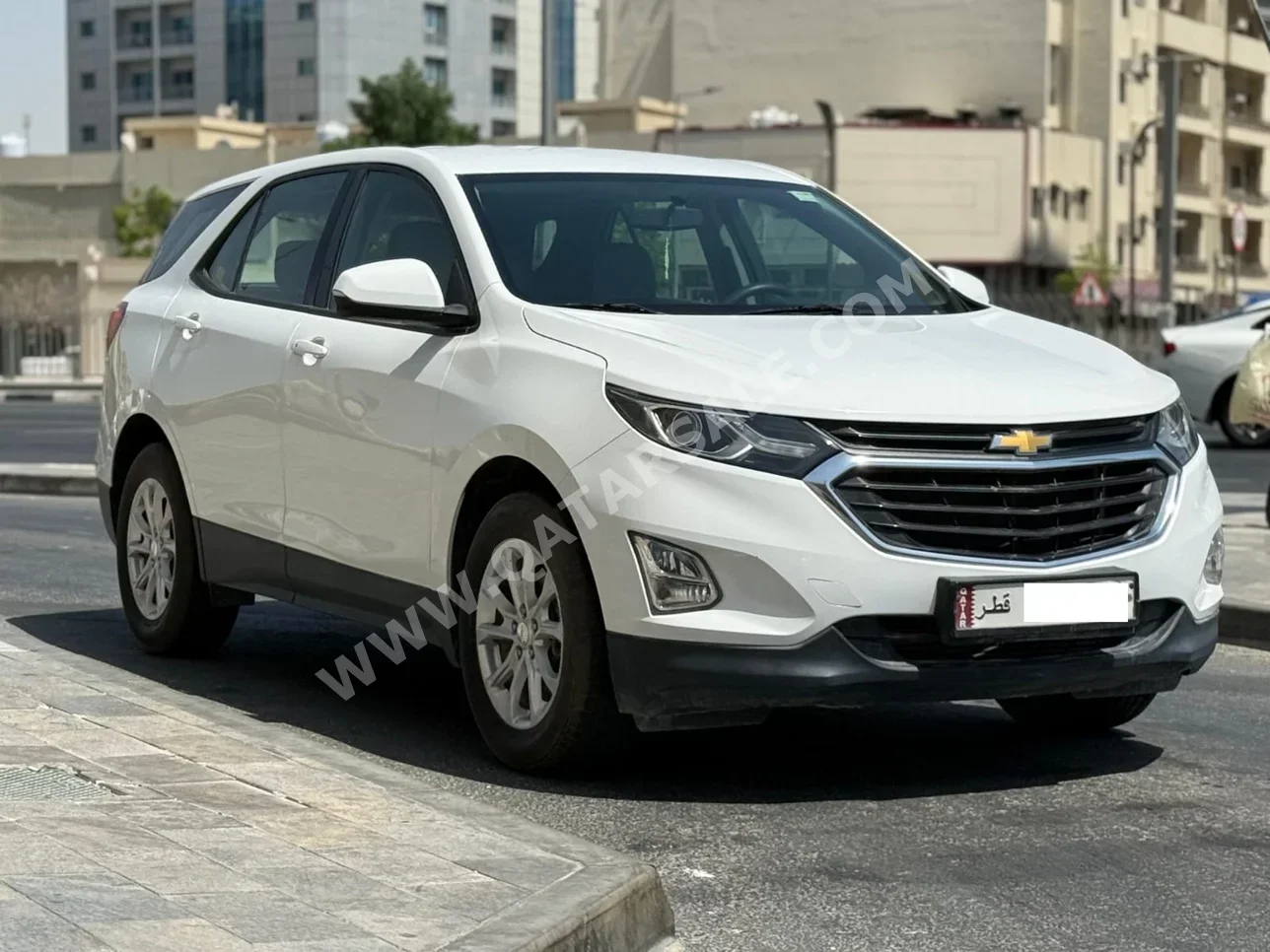 Chevrolet  Equinox  2019  Automatic  62,000 Km  4 Cylinder  Front Wheel Drive (FWD)  SUV  White