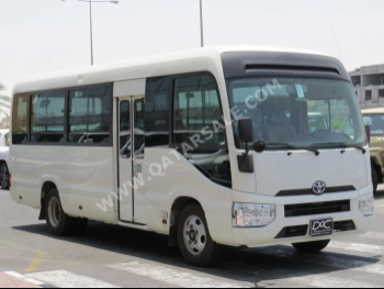 Toyota  Coaster  2020  Manual  126,000 Km  4 Cylinder  Rear Wheel Drive (RWD)  Van / Bus  White