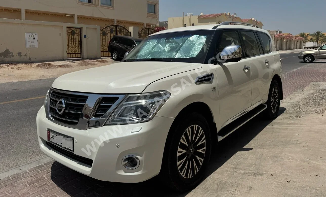 Nissan  Patrol  Platinum  2016  Automatic  138,000 Km  8 Cylinder  Four Wheel Drive (4WD)  SUV  White