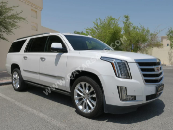 Cadillac  Escalade  2019  Automatic  124,000 Km  8 Cylinder  Four Wheel Drive (4WD)  SUV  White