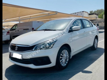 Suzuki  Ciaz  2023  Automatic  83,205 Km  4 Cylinder  Front Wheel Drive (FWD)  Sedan  White  With Warranty