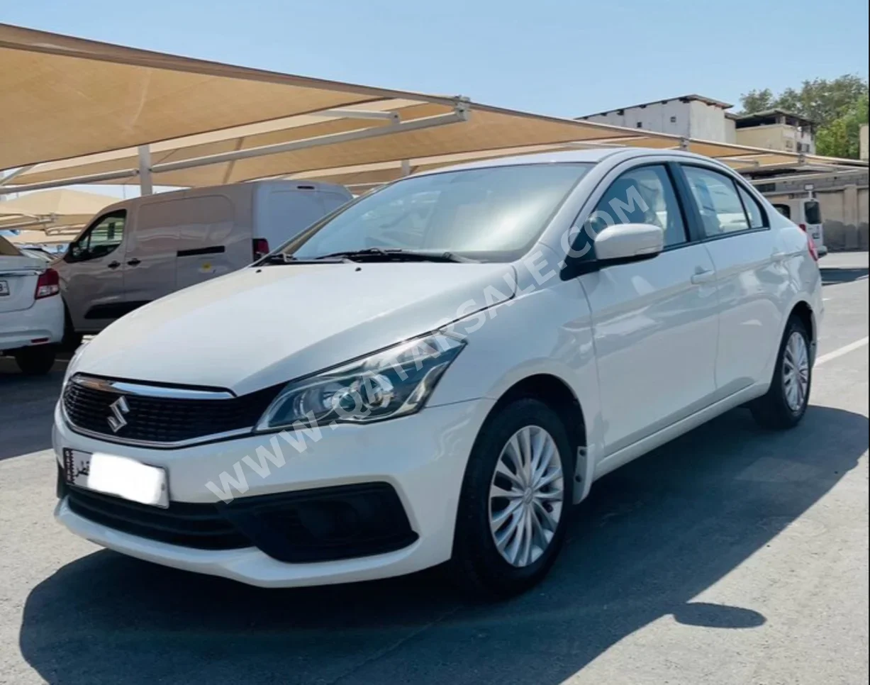 Suzuki  Ciaz  2023  Automatic  83,205 Km  4 Cylinder  Front Wheel Drive (FWD)  Sedan  White  With Warranty