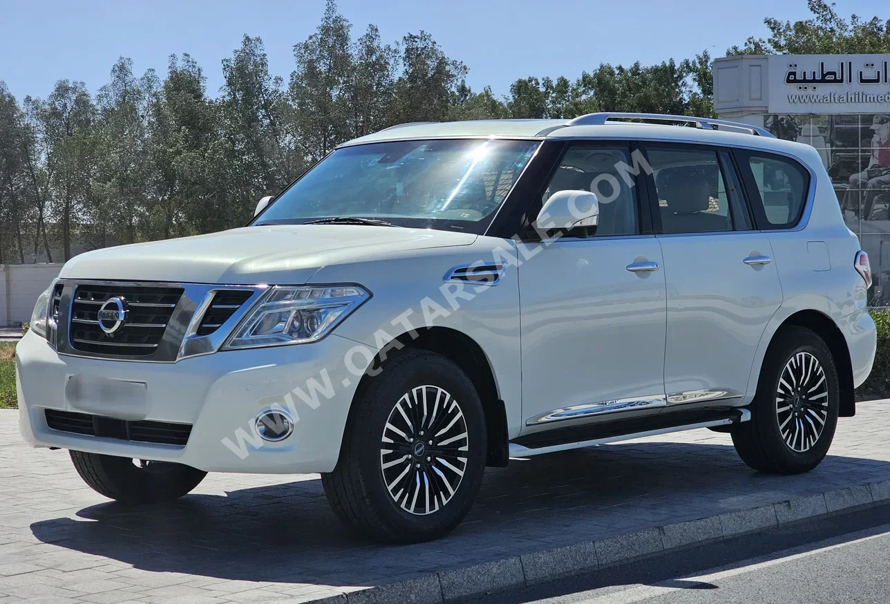 Nissan  Patrol  LE  2012  Automatic  313,000 Km  8 Cylinder  Four Wheel Drive (4WD)  SUV  White