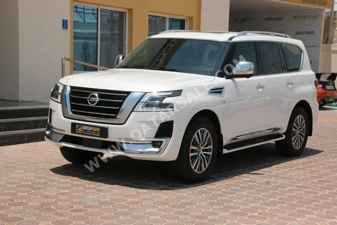 Nissan  Patrol  Platinum  2020  Automatic  97,000 Km  8 Cylinder  Four Wheel Drive (4WD)  SUV  White  With Warranty