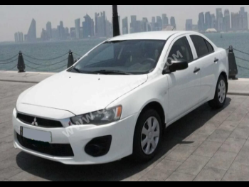 Mitsubishi  Lancer  EX  2017  Automatic  175,000 Km  4 Cylinder  Front Wheel Drive (FWD)  Sedan  White  With Warranty