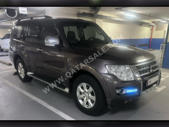 Mitsubishi  Pajero  GLS  2015  Automatic  242,000 Km  6 Cylinder  Four Wheel Drive (4WD)  SUV  Brown