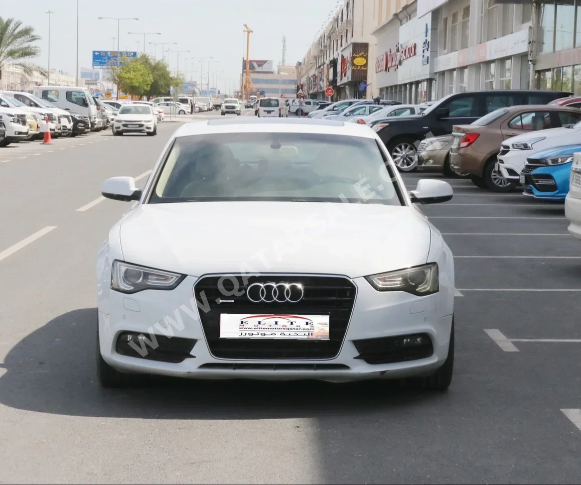 Audi  A5  2.0 T  2014  Automatic  88,000 Km  4 Cylinder  Rear Wheel Drive (RWD)  Sedan  White