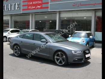 Audi  A5  2.0 T  2014  Automatic  66,000 Km  4 Cylinder  Rear Wheel Drive (RWD)  Sedan  Gray