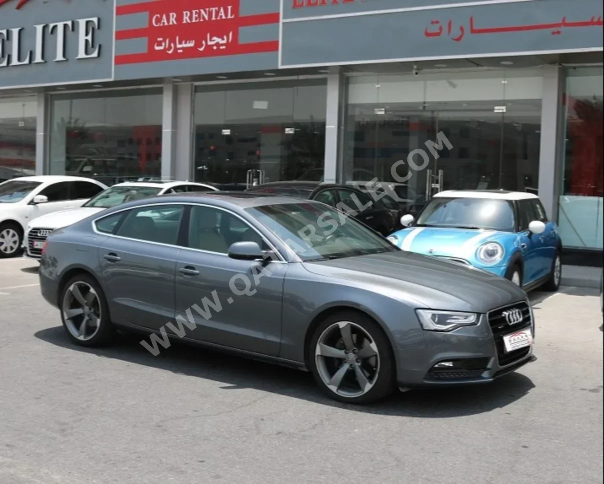 Audi  A5  2.0 T  2014  Automatic  66,000 Km  4 Cylinder  Rear Wheel Drive (RWD)  Sedan  Gray
