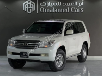 Toyota  Land Cruiser  G  2010  Automatic  456,000 Km  6 Cylinder  Four Wheel Drive (4WD)  SUV  White