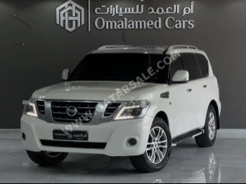 Nissan  Patrol  SE  2012  Automatic  324,000 Km  8 Cylinder  Four Wheel Drive (4WD)  SUV  White