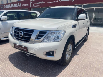 Nissan  Patrol  SE  2016  Automatic  247,000 Km  8 Cylinder  Four Wheel Drive (4WD)  SUV  White
