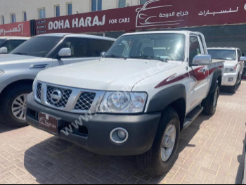 Nissan  Patrol  Pickup  2021  Manual  65,000 Km  6 Cylinder  Four Wheel Drive (4WD)  Pick Up  White