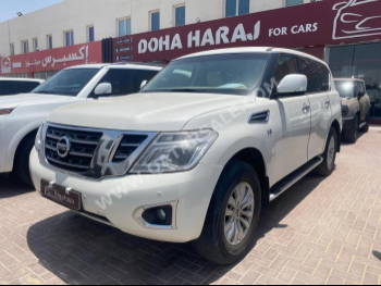 Nissan  Patrol  SE  2014  Automatic  227,000 Km  8 Cylinder  Four Wheel Drive (4WD)  SUV  White