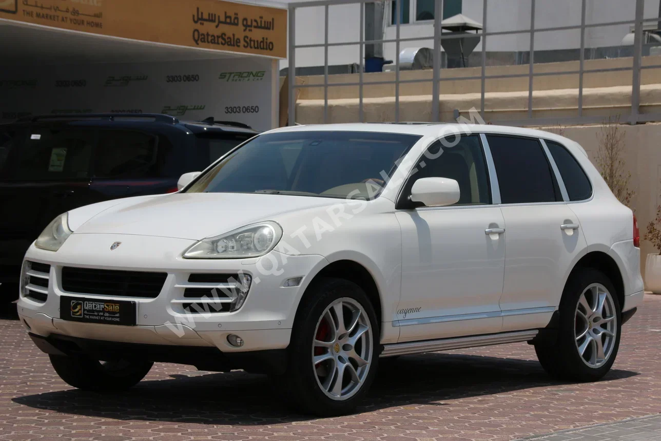 بورش  كيان  اس  2009  اوتوماتيك  228,000 كم  6 سلندر  دفع رباعي  اس يو في  أبيض