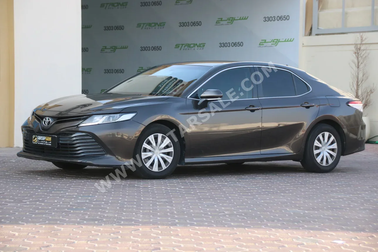 Toyota  Camry  LE  2019  Automatic  306,420 Km  4 Cylinder  Front Wheel Drive (FWD)  Sedan  Brown