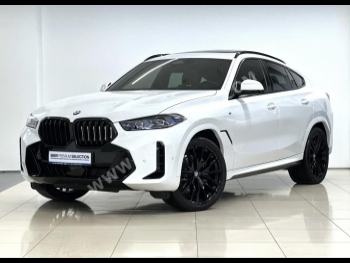 BMW  X-Series  X6 M40i  2024  Automatic  31,000 Km  6 Cylinder  Four Wheel Drive (4WD)  SUV  White  With Warranty