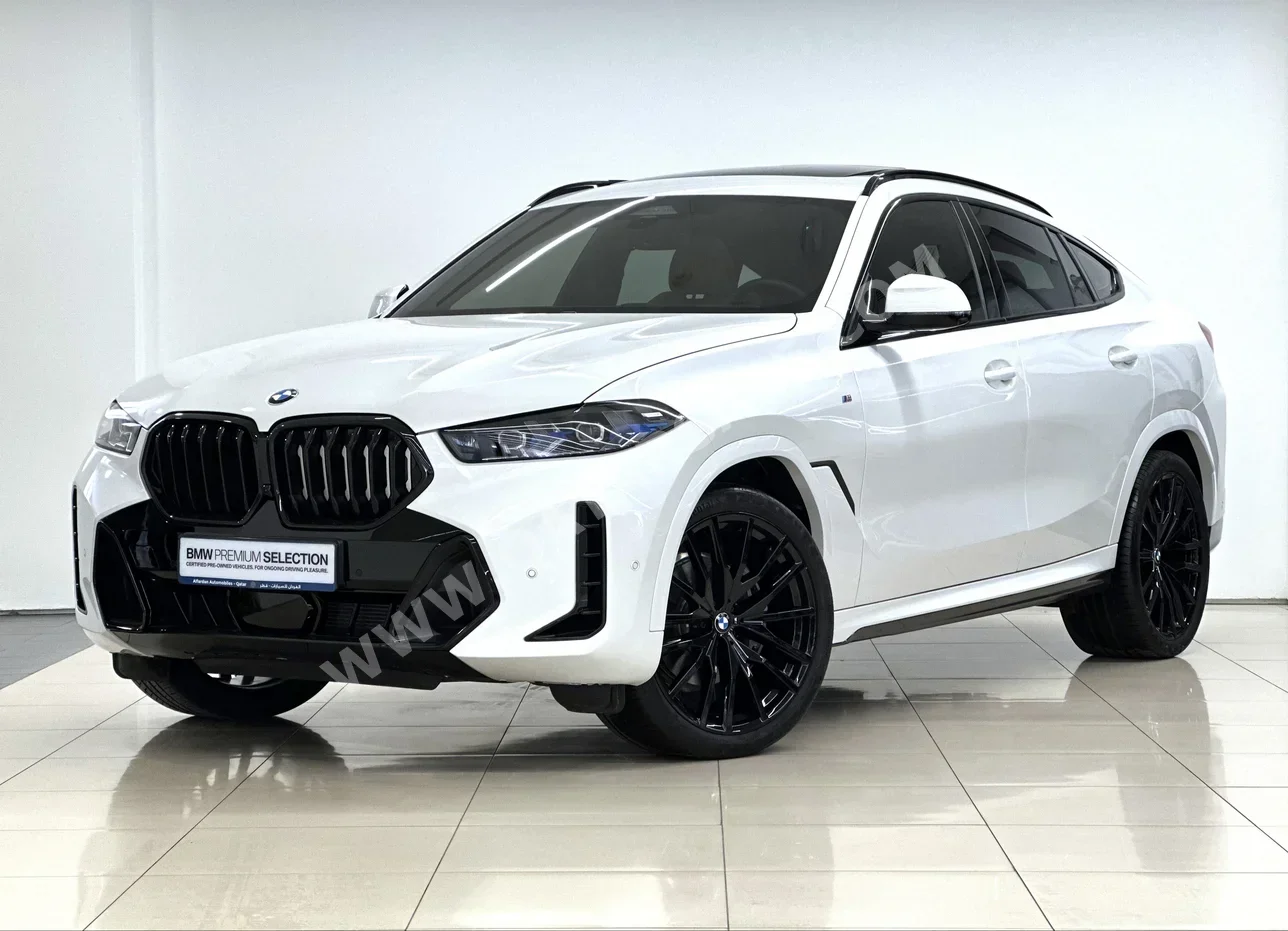 BMW  X-Series  X6 M40i  2024  Automatic  31,000 Km  6 Cylinder  Four Wheel Drive (4WD)  SUV  White  With Warranty