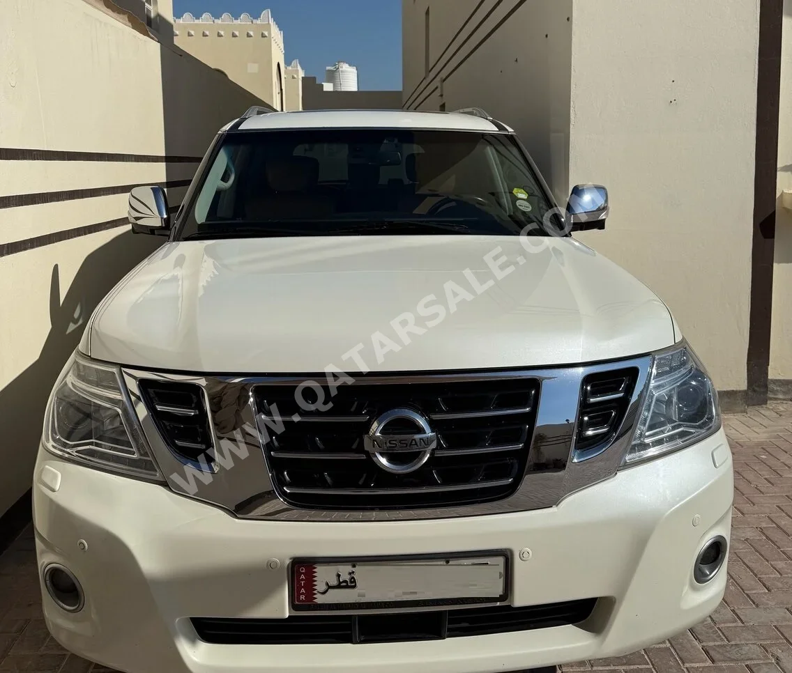 Nissan  Patrol  Platinum  2016  Automatic  164,000 Km  8 Cylinder  Four Wheel Drive (4WD)  SUV  White