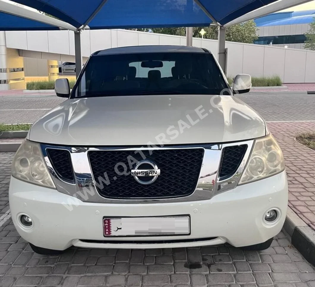 Nissan  Patrol  SE  2013  Automatic  275,000 Km  8 Cylinder  Four Wheel Drive (4WD)  SUV  Amber