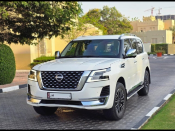 Nissan  Patrol  Platinum  2023  Automatic  46,000 Km  6 Cylinder  Four Wheel Drive (4WD)  SUV  White  With Warranty