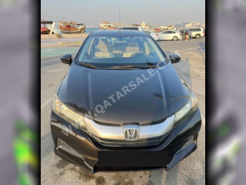 Honda  City  2015  Automatic  175,000 Km  4 Cylinder  Front Wheel Drive (FWD)  Sedan  Brown