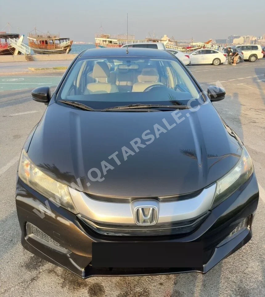 Honda  City  2015  Automatic  175,000 Km  4 Cylinder  Front Wheel Drive (FWD)  Sedan  Brown