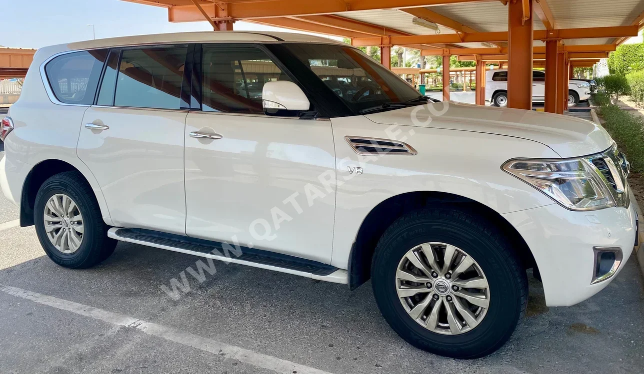Nissan  Patrol  SE  2016  Automatic  184,000 Km  8 Cylinder  Four Wheel Drive (4WD)  SUV  White