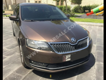 Skoda  Rapid  2019  Automatic  121,000 Km  4 Cylinder  Sedan  Brown