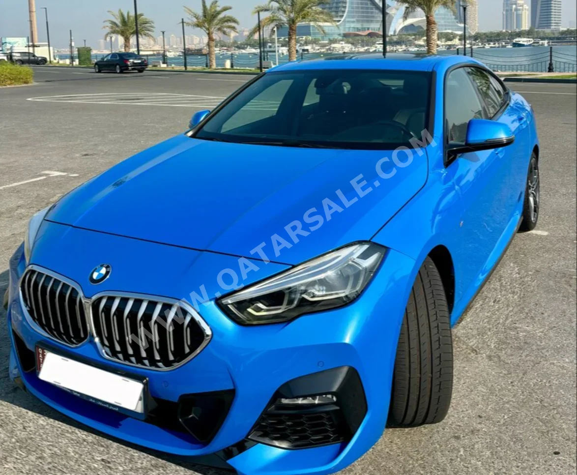 BMW  2-Series  218i  2021  Automatic  83,000 Km  3 Cylinder  Front Wheel Drive (FWD)  Sedan  Blue  With Warranty