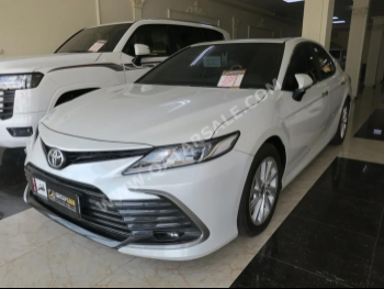 Toyota  Camry  GLE  2023  Automatic  12,000 Km  4 Cylinder  Front Wheel Drive (FWD)  Sedan  White  With Warranty