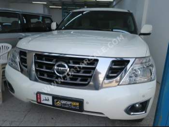 Nissan  Patrol  SE  2017  Automatic  136,000 Km  6 Cylinder  Four Wheel Drive (4WD)  SUV  White
