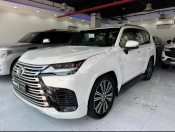 Lexus  LX  600  2023  Automatic  64,000 Km  6 Cylinder  Four Wheel Drive (4WD)  SUV  White  With Warranty