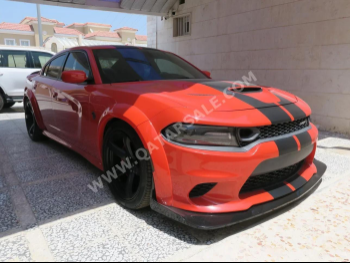 Dodge  Charger  Hellcat  2019  Automatic  39,000 Km  8 Cylinder  Rear Wheel Drive (RWD)  Sedan  Orange
