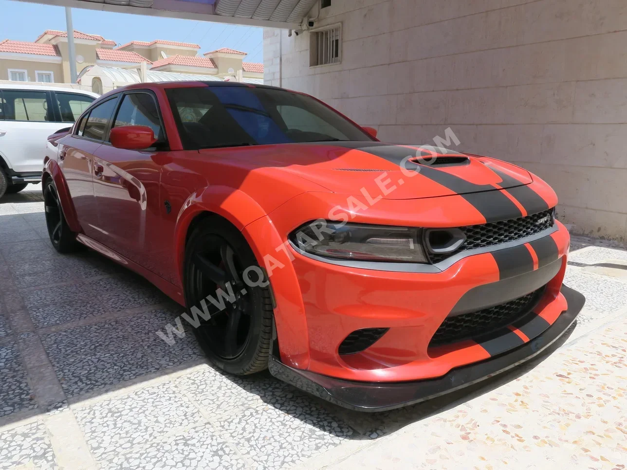 Dodge  Charger  Hellcat  2019  Automatic  39,000 Km  8 Cylinder  Rear Wheel Drive (RWD)  Sedan  Orange