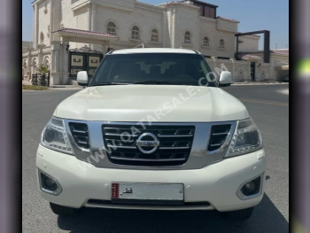 Nissan  Patrol  SE  2014  Automatic  183,000 Km  8 Cylinder  Four Wheel Drive (4WD)  SUV  White