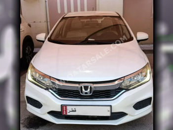 Honda  City  2019  Automatic  125,000 Km  4 Cylinder  Front Wheel Drive (FWD)  Sedan  White