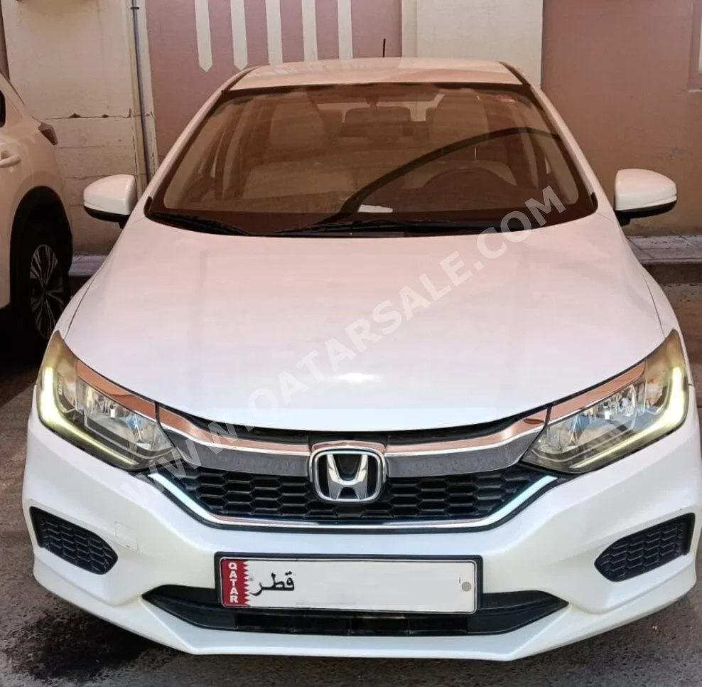 Honda  City  2019  Automatic  125,000 Km  4 Cylinder  Front Wheel Drive (FWD)  Sedan  White