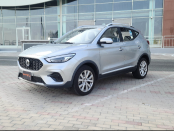 MG  Zs  2023  Automatic  26,200 Km  4 Cylinder  Front Wheel Drive (FWD)  SUV  Silver  With Warranty