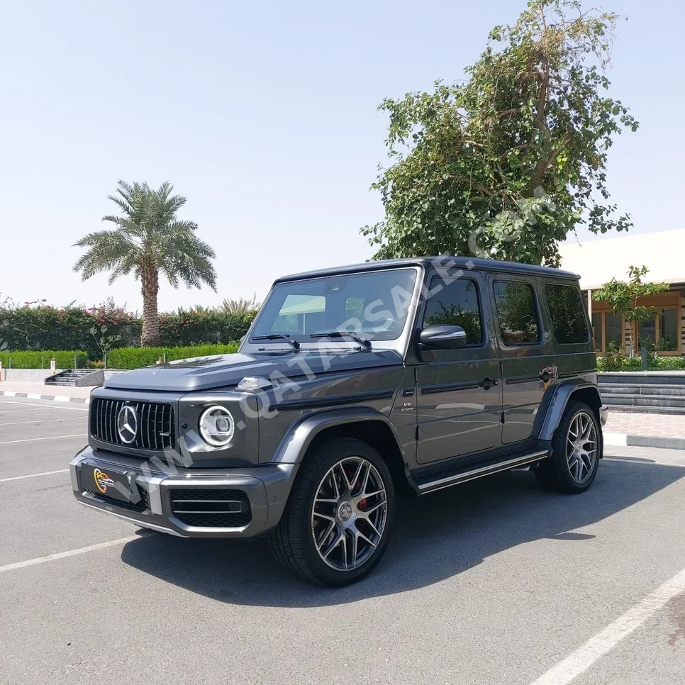 مرسيدس - بنز  جي - كلاس  63 اي ام جي  2019  اوتوماتيك  90,000 كم  8 سلندر  دفع رباعي  اس يو في  رمادي