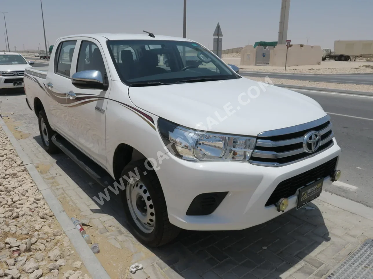 Toyota  Hilux  2019  Automatic  10,000 Km  4 Cylinder  Four Wheel Drive (4WD)  Pick Up  White