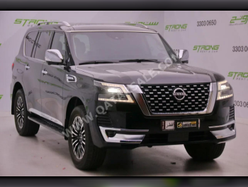 Nissan  Patrol  Platinum  2022  Automatic  63,812 Km  6 Cylinder  Four Wheel Drive (4WD)  SUV  Black
