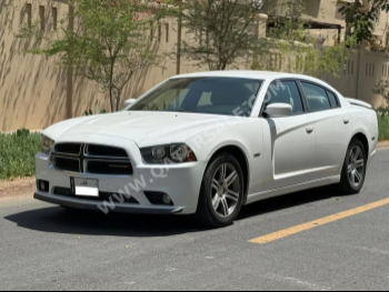 Dodge  Charger  RT  2013  Automatic  221,000 Km  8 Cylinder  Rear Wheel Drive (RWD)  Sedan  White